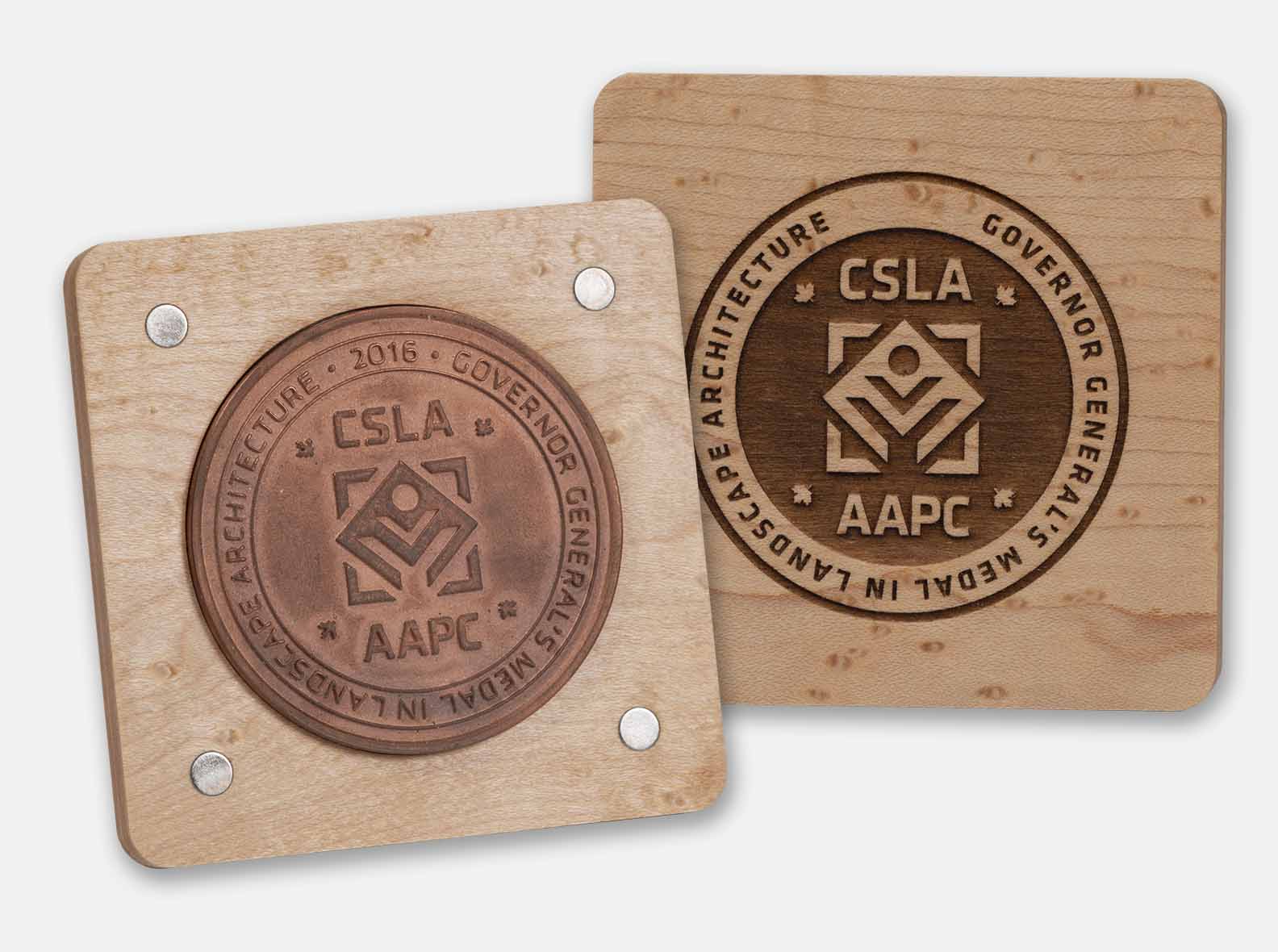 Birdseye Maple presentation case with rare earth magnetic closure. CNC milled cutout for medal. Laser engraved lid. Hand rubbed with natural oil finish.